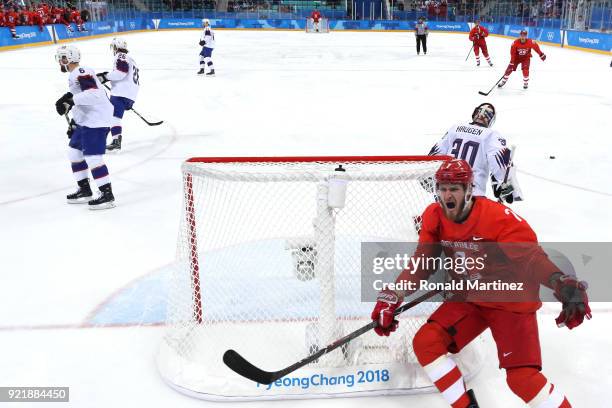 Ivan Telegin of Olympic Athlete from Russia celebrates a goal scored by teammate Mikhail Grigorenko against Lars Haugen of Norway in the first period...