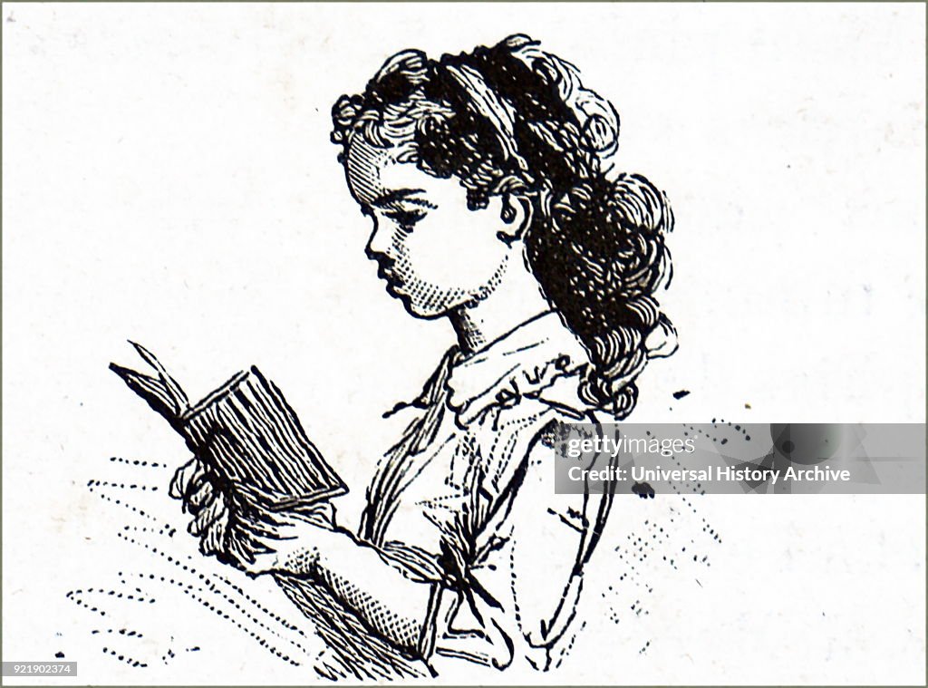 A young girl reading.