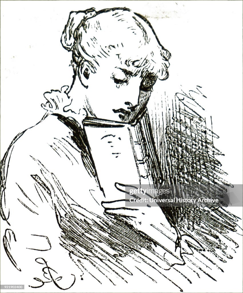 A young girl reading.