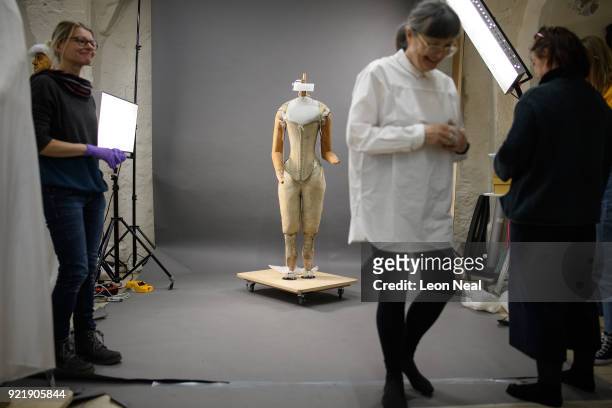 Costume historian Jenny Tiramani smiles after fitting a 'pair of straight bodies' to the funeral effigy of Elizabeth I at Westminster Abbey on...