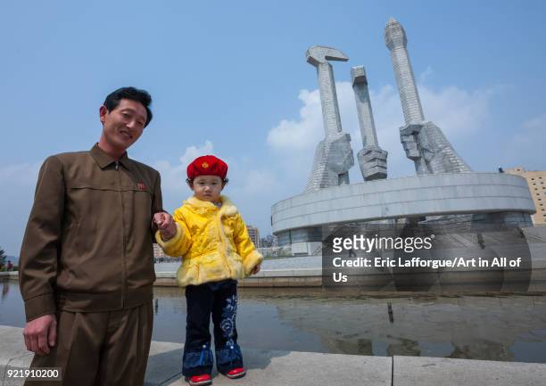 North Korean father and daughter near monument to Party founding, Pyongan Province, Pyongyang, North Korea on April 13, 2008 in Pyongyang, North...