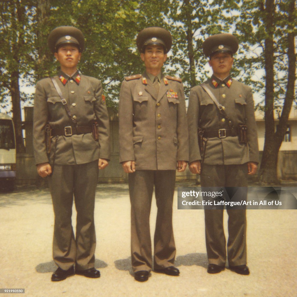 Polaroid picture of North Korean soldiers in the joint security area of the dmz, North Hwanghae Province, Panmunjom, North Korea...
