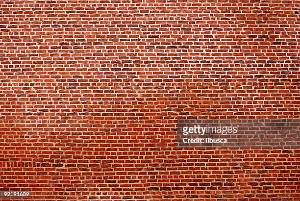 big red brick wall - brick wall texture stock pictures, royalty-free photos & images