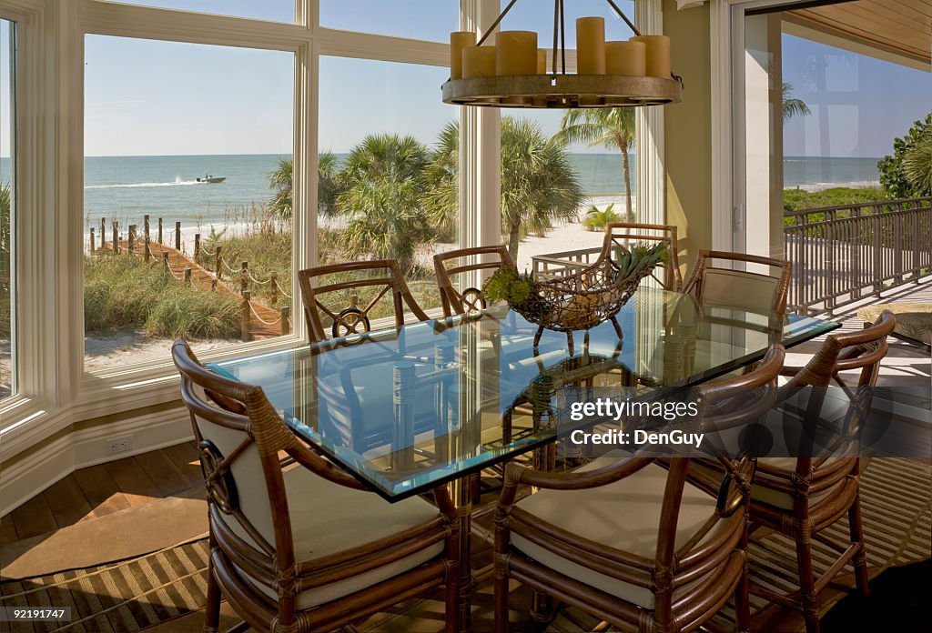 Beach House Dining Room With Beautiful View Of Shore High-Res Stock ...