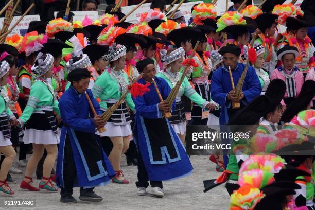 Miao people play Lusheng to worship ancestors and pray for good weather on the fifth day of the Lunar New Year on February 20, 2018 in Qiannan Buyei...