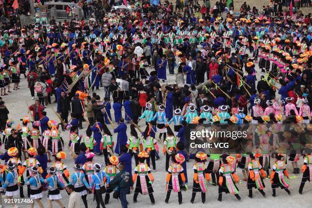 Miao people play Lusheng to worship ancestors and pray for good weather on the fifth day of the Lunar New Year on February 20, 2018 in Qiannan Buyei...