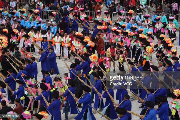 Miao people play Lusheng to worship ancestors and pray for good weather on the fifth day of the Lunar New Year on February 20, 2018 in Qiannan Buyei...