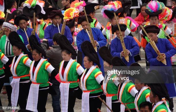 Miao people play Lusheng to worship ancestors and pray for good weather on the fifth day of the Lunar New Year on February 20, 2018 in Qiannan Buyei...