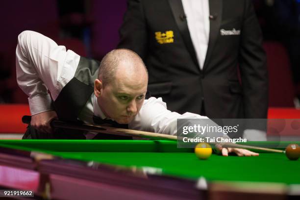 Graeme Dott of Scotland plays a shot during his first round match against Joe Perry of England on day two of 2018 Ladbrokes World Grand Prix at Guild...