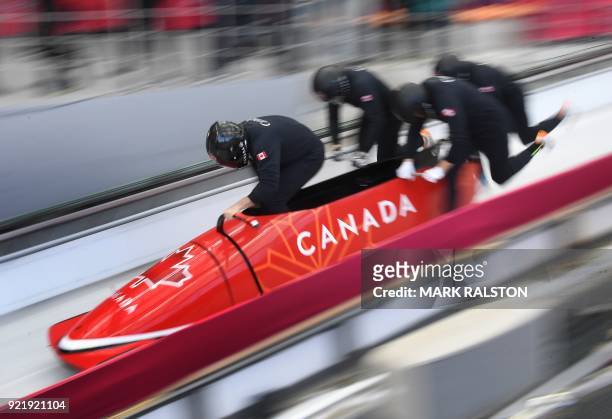 Pilot Justin Kripps of Canada leads his team as they start the 4-man bobsleigh training session during the Pyeongchang 2018 Winter Olympic Games, at...