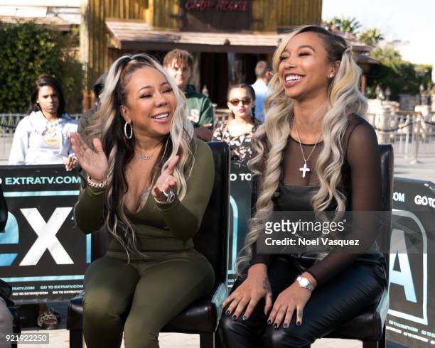 Tameka Cottle and Zonnique Pullins visit "Extra" at Universal Studios Hollywood on February 20, 2018 in Universal City, California.