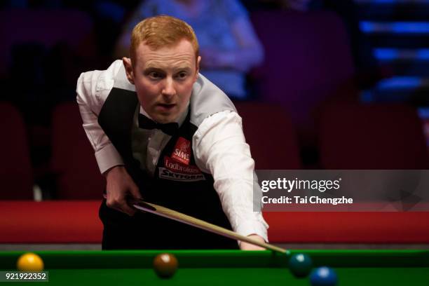 Anthony McGill of Scotland plays a shot during his first round match against Cao Yupeng of China on day two of 2018 Ladbrokes World Grand Prix at...