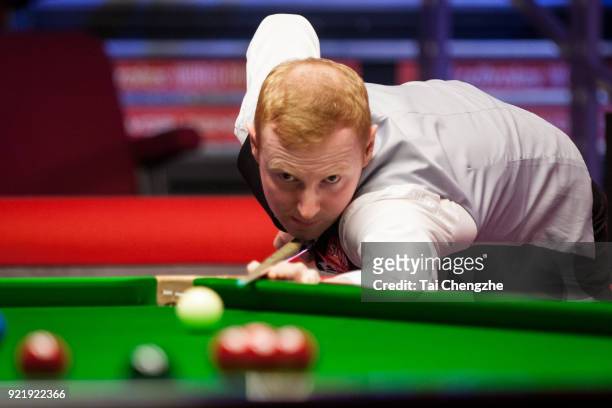 Anthony McGill of Scotland plays a shot during his first round match against Cao Yupeng of China on day two of 2018 Ladbrokes World Grand Prix at...