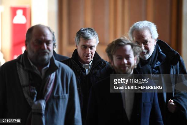French former budget minister Jerome Cahuzac and his lawyers Eric Dupond-Moretti , Antoine Vey and Jean-Alain Michel leave Paris' courthouse on...