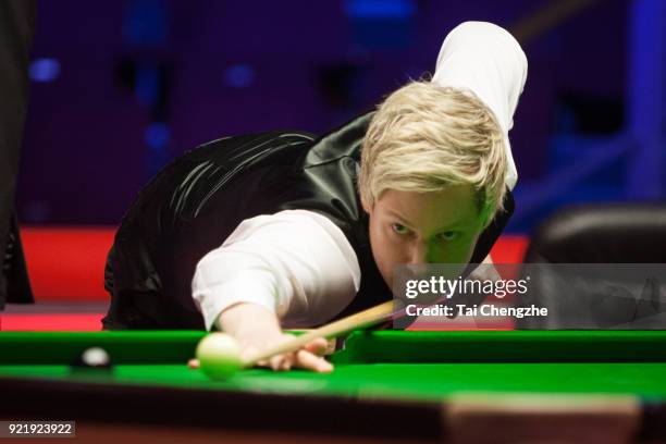 Neil Robertson of Australia plays a shot during his first round match against David Gilbert of England on day two of 2018 Ladbrokes World Grand Prix...