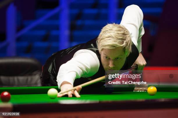 Neil Robertson of Australia plays a shot during his first round match against David Gilbert of England on day two of 2018 Ladbrokes World Grand Prix...