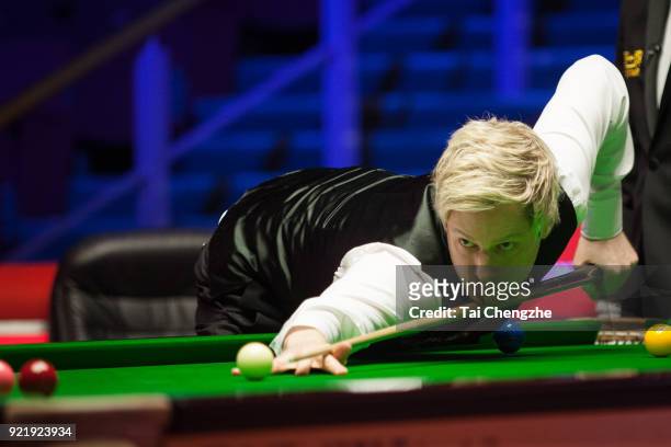 Neil Robertson of Australia plays a shot during his first round match against David Gilbert of England on day two of 2018 Ladbrokes World Grand Prix...