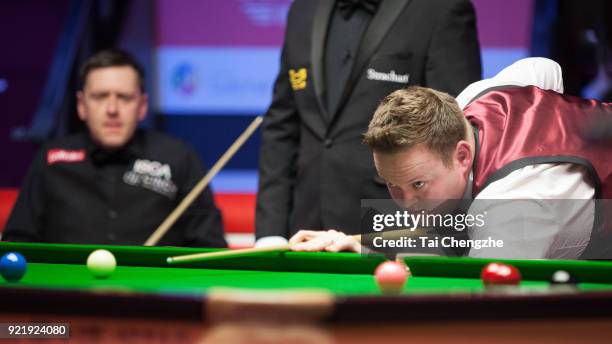 Shaun Murphy of England plays a shot during his first round match against Ricky Walden of England on day two of 2018 Ladbrokes World Grand Prix at...