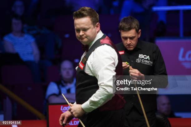Shaun Murphy of England reacts during his first round match against Ricky Walden of England on day two of 2018 Ladbrokes World Grand Prix at Guild...