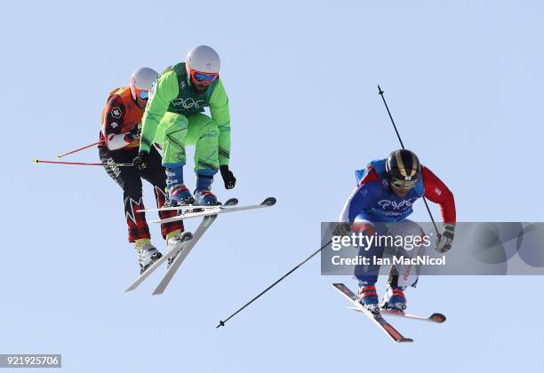 Amaud Bovolenta of France and Filip Flisar of Slovenia come over the final jump during the Small Final in the Men's Ski Cross at Phoenix Snow Park on...