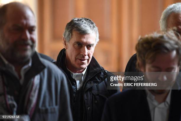 French former budget minister Jerome Cahuzac reacts as he leaves, with his lawyers Eric Dupond-Moretti and Antoine Vey , Paris' courthouse on...