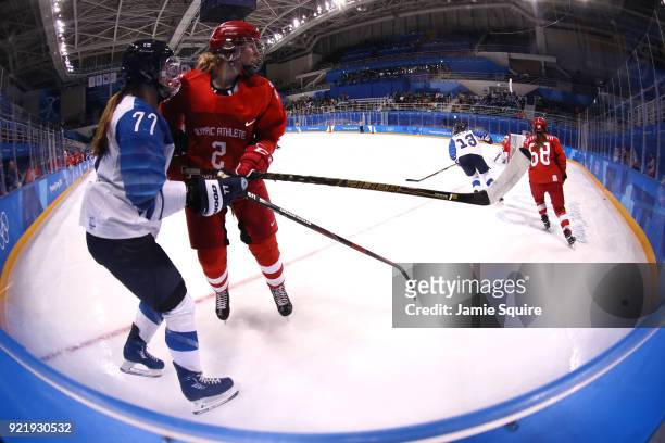 Susanna Tapani of Finland and Angelina Goncharenko of Olympic Athlete from Russia compete for the puck during the Women's Ice Hockey Bronze Medal...