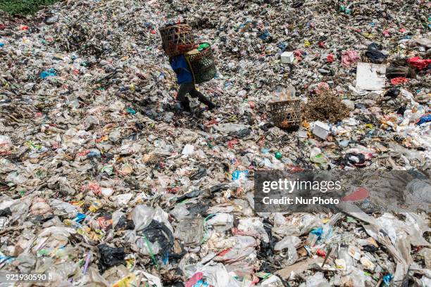 Scavengers finding garbages that can be reused at the waste management location in Serpong, Bante, Indonesia on 21 February 2018. Cipeucang-South...