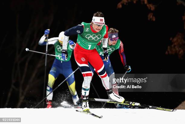 Maiken Caspersen Falla of Norway leads the pack during the Cross Country Ladies' Team Sprint Free Final on day 12 of the PyeongChang 2018 Winter...
