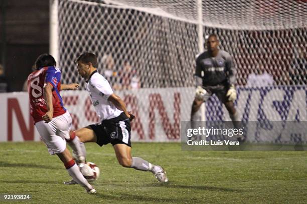 Brazil's Botafogo Diego vies for the ball with Paraguay's Cerro Porteno Luis Caceres during their match as part of the 2009 Copa Sudamericana at the...