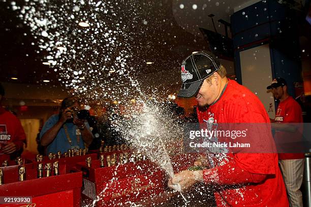 Joe Blanton of the Philadelphia Phillies sprays champagne as they celebrate defeating the Los Angeles Dodgers 10-4 to advance to the World Series in...