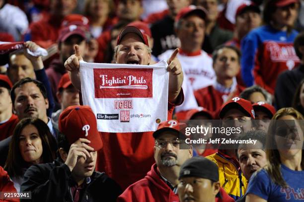 Fans celebrate the Philadelphia Phillies defeating the Los Angeles Dodgers 10-4 to advance to the World Series in Game Five of the NLCS during the...