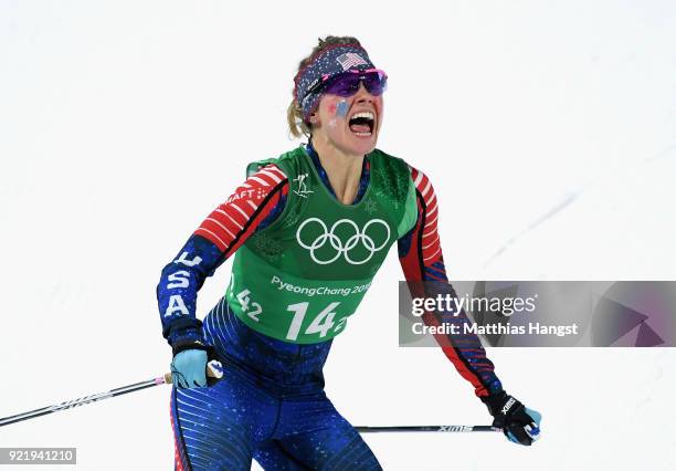 Jessica Diggins of the United States celebrates as she wins gold during the Cross Country Ladies' Team Sprint Free Final on day 12 of the PyeongChang...