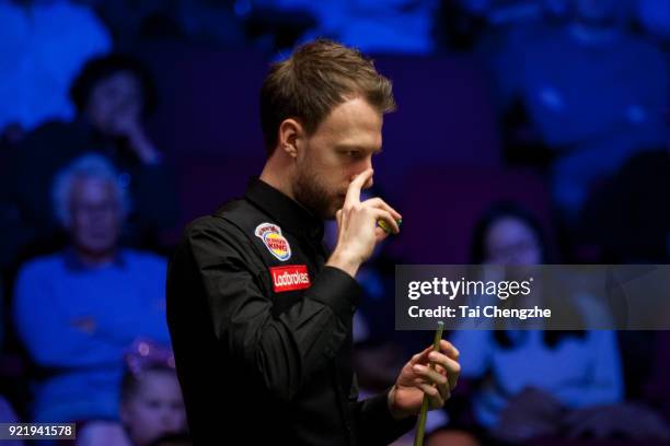 Judd Trump of England reacts during his first round match againstMichael White of Wales on day two of 2018 Ladbrokes World Grand Prix at Guild Hall...