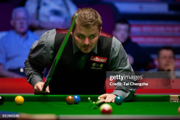 Michael White of Wales reacts during his first round match against Judd Trump of England on day two of 2018 Ladbrokes World Grand Prix at Guild Hall...