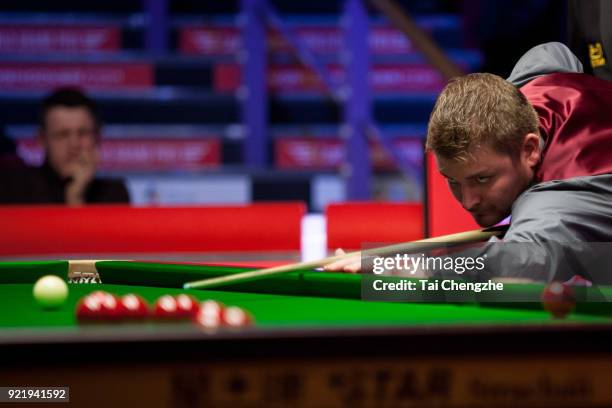 Michael White of Wales plays a shot during his first round match against Judd Trump of England on day two of 2018 Ladbrokes World Grand Prix at Guild...