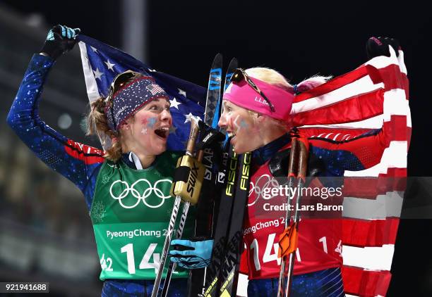 Jessica Diggins of the United States and Kikkan Randall of the United States celebrate as they win gold during the Cross Country Ladies' Team Sprint...