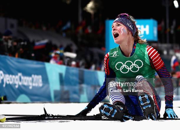 Jessica Diggins of the United States reacts as she wins gold during the Cross Country Ladies' Team Sprint Free Final on day 12 of the PyeongChang...