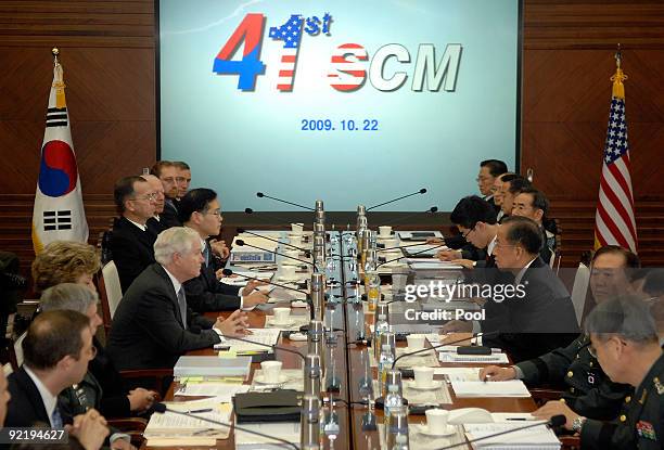 Defense Secretary Robert Gates talks with the South Korean defense minister Kim Tae-Young during Security Consultative Meeting at the defense...