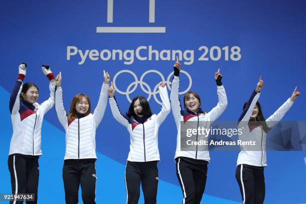 Gold medalists South Korea celebrate during the medal ceremony for the Ladies Short Track Speed Skating 3000m Relay on day twelve of the PyeongChang...