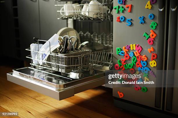 dishwasher - fridge magnets stock-fotos und bilder