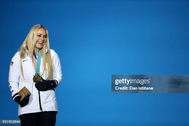 Bronze medallist Lindsey Vonn of the United States celebrates during the medal ceremony for the Ladies' Downhill on day twelve of the PyeongChang...