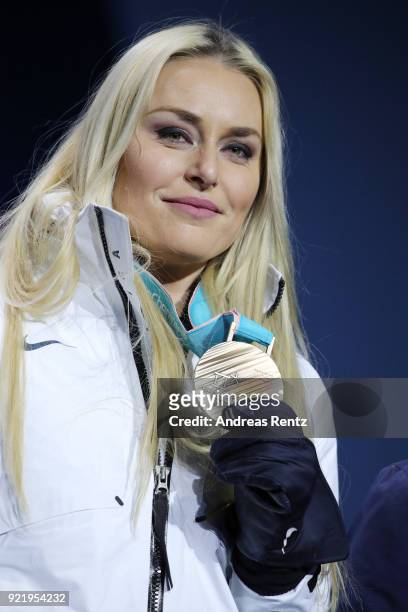 Bronze medallist Lindsey Vonn of the United States celebrates during the medal ceremony for the Ladies' Downhill on day twelve of the PyeongChang...