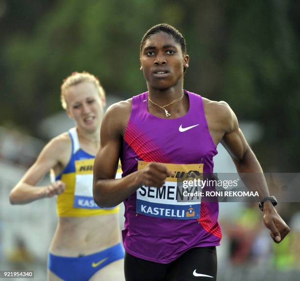 South African athlete Caster Semenya competes in the women's 800m race in Lappeenranta, Eastern Finland on July 15, 2010 for her first race since the...