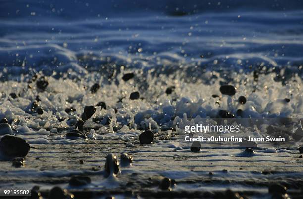pebble dance (rolling stones) - after the waves - s0ulsurfing stock pictures, royalty-free photos & images