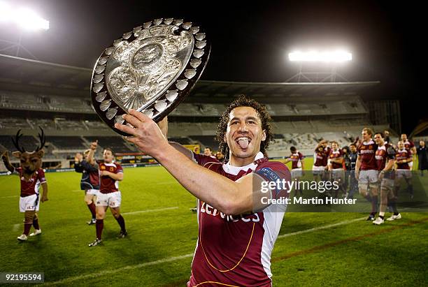 Jason Kawau of Southland celebrates with the Ranfurly Shield after the Air New Zealand Cup match between Canterbury and Southland at AMI Stadium on...