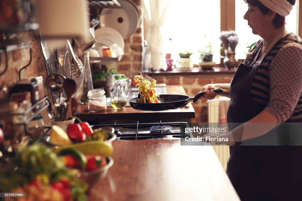 Cooking vegetables, step eight, tossing