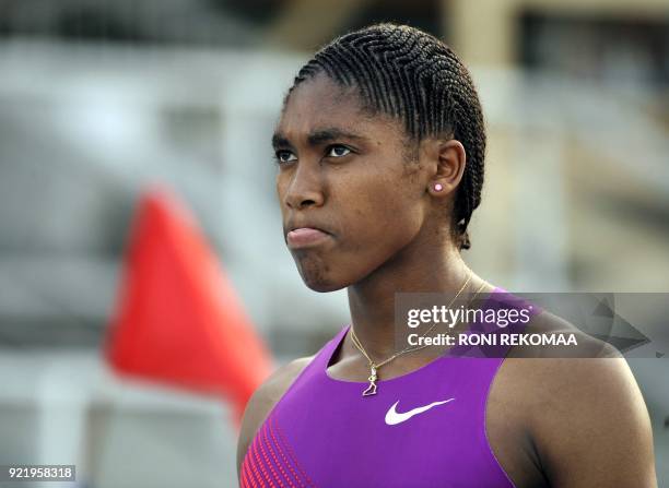 South African athlete Caster Semenya grimaces as she gets ready in Lappeenranta, Eastern Finland on July 15, 2010 for her first start since the...