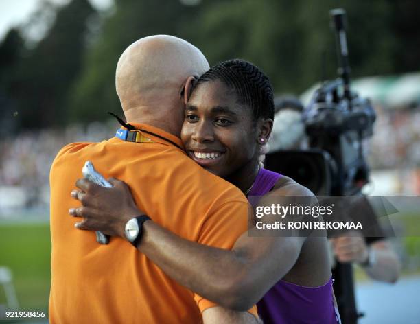 South African athlete Caster Semenya gets a hug from her manager, Finnish Jukka Harkonen, in Lappeenranta, Eastern Finland on July 15, 2010 for her...