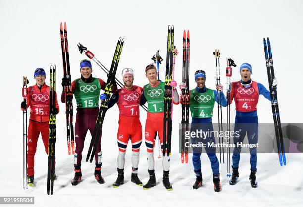Silver medalists Denis Spitsov and Alexander Bolshunov of Olympic Athlete from Russia, gold medalists Martin Johnsrud Sundby and Johannes Hoesflat of...