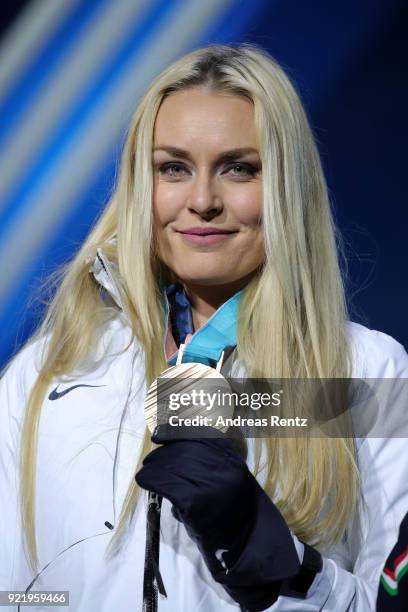 Bronze medallist Lindsey Vonn of the United States celebrates during the medal ceremony for the Ladies' Downhill on day twelve of the PyeongChang...